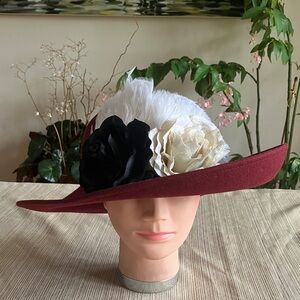 Elegant Burgundy Wool Wide-Brim Hat with Velvet Floral and White Feather Accents